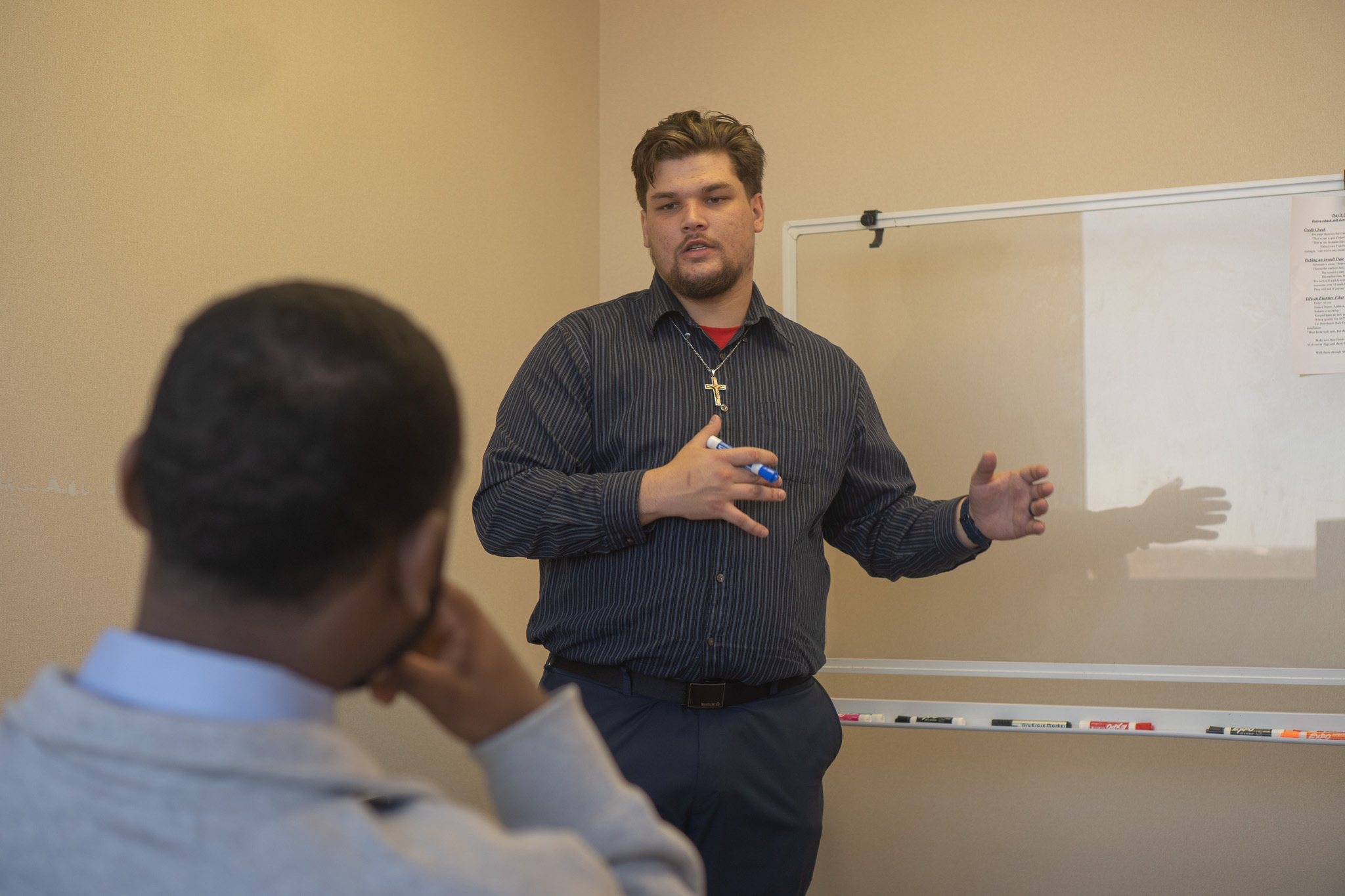 A young employee presenting customer acquisition strategies