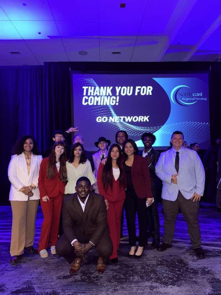 A group of professionals meeting together to implement customer acquisition strategies