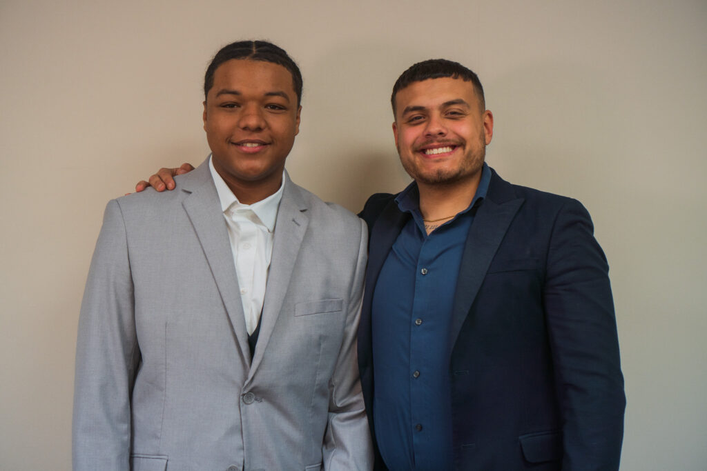 A smiling salesperson with a sales mindset