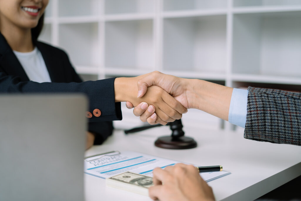 A handshake symbolizing the legitimacy of Ethereal Consulting