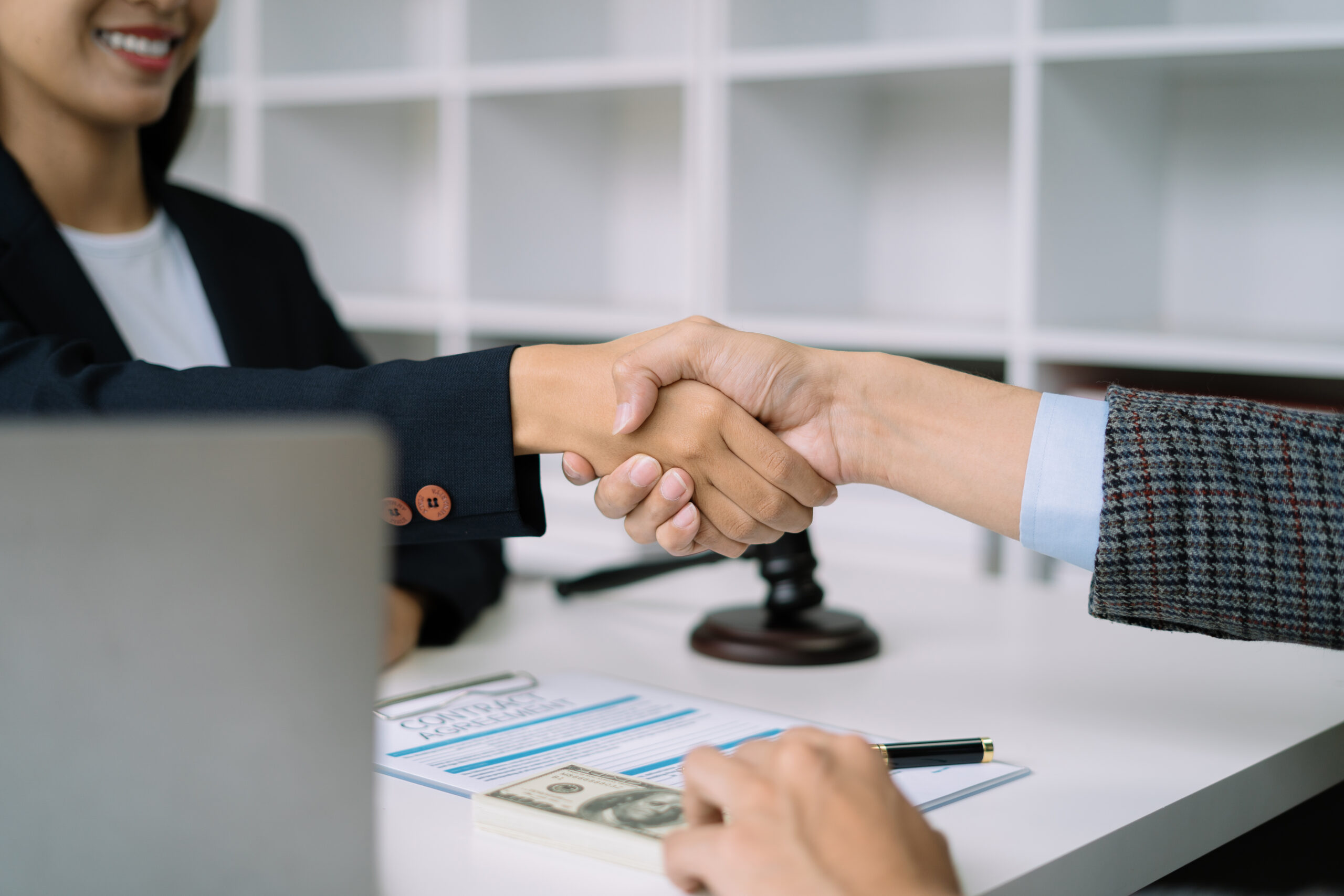A handshake symbolizing the legitimacy of Ethereal Consulting
